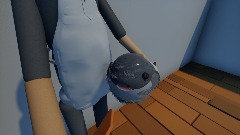 P ufferfish eating carrot