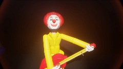 Ronald McDonald with his guitar