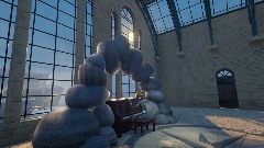 Xever performs under a pebble arch