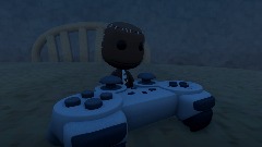 Sackboy bonks his head on a Ps3 controller