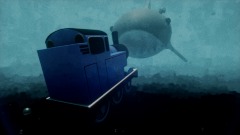 Thomas swims in the ocean