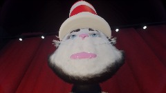 Cat in the hat dancing to nyan cat