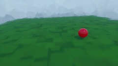 a red ball bouncing on grass