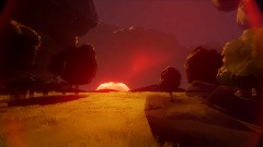 Forest Giving Way To A Field On An Overcast Evening